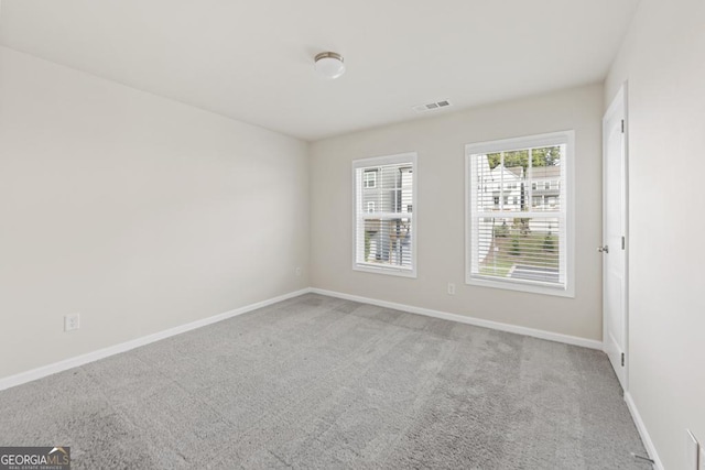 view of carpeted spare room