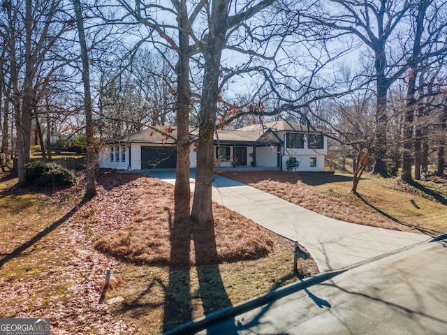 single story home with a garage