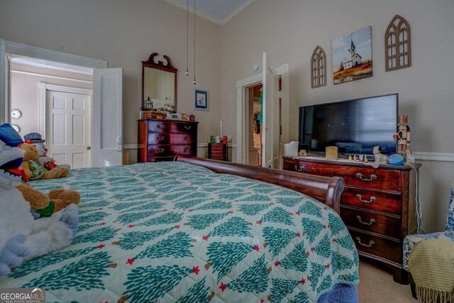 bedroom featuring carpet floors, high vaulted ceiling, and crown molding