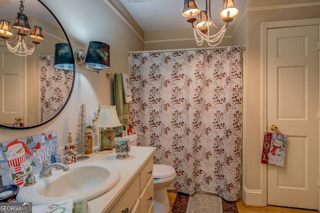 full bathroom with toilet, a shower with curtain, vanity, and an inviting chandelier