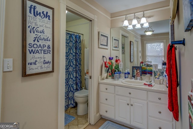 bathroom featuring tile patterned flooring, vanity, toilet, and curtained shower