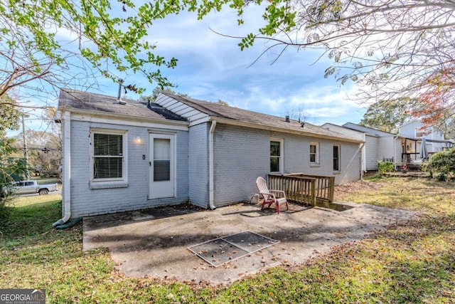 back of property with a patio area