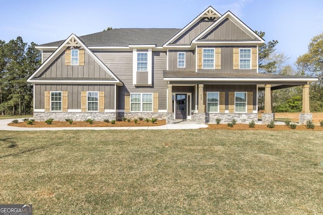 408 Bella Notte Cir Unit 26A, Warner Robins, GA 31088 - craftsman house featuring board and batten siding, stone siding, and a front lawn