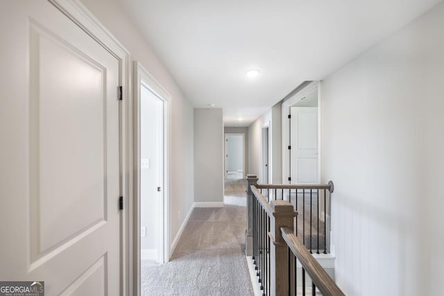 408 Bella Notte Cir Unit 26A, Warner Robins, GA 31088 - hall with an upstairs landing, light colored carpet, and recessed lighting