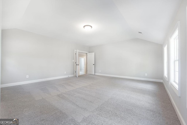 408 Bella Notte Cir Unit 26A, Warner Robins, GA 31088 - carpeted empty room featuring vaulted ceiling