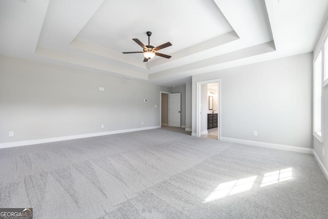 408 Bella Notte Cir Unit 26A, Warner Robins, GA 31088 - spare room with a raised ceiling, light colored carpet, ceiling fan, and plenty of natural light