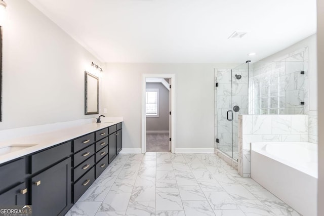 408 Bella Notte Cir Unit 26A, Warner Robins, GA 31088 - bathroom with marble finish floors, a garden tub, a shower stall, double vanity, and recessed lighting