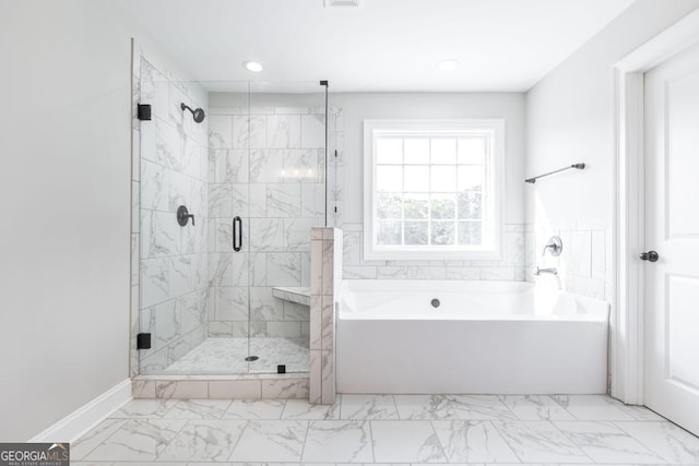 408 Bella Notte Cir Unit 26A, Warner Robins, GA 31088 - bathroom with marble look tiles, a garden tub, a shower stall, and recessed lighting