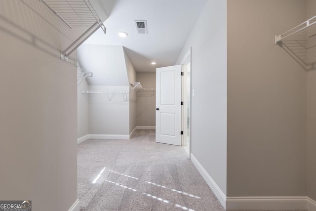 408 Bella Notte Cir Unit 26A, Warner Robins, GA 31088 - walk in closet featuring carpet