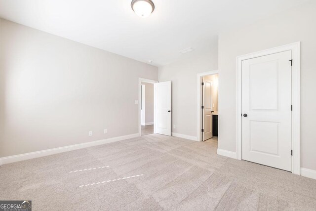 408 Bella Notte Cir Unit 26A, Warner Robins, GA 31088 - unfurnished bedroom with light carpet