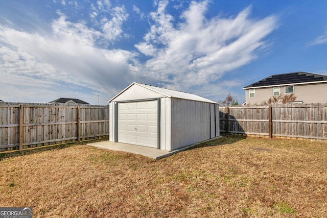 garage featuring a yard