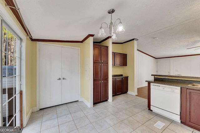 kitchen with ornamental molding, a textured ceiling, white dishwasher, pendant lighting, and an inviting chandelier