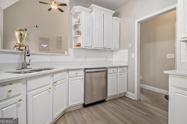 kitchen featuring a chandelier, white cabinetry, sink, and stainless steel appliances