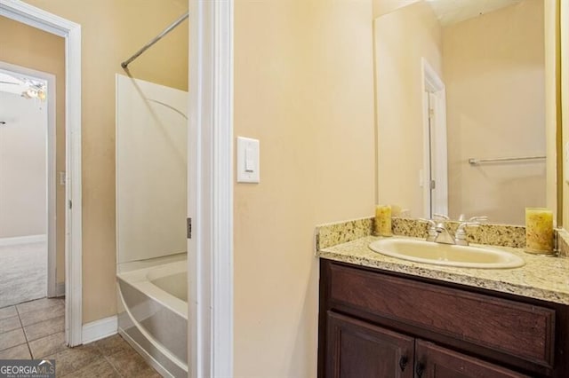 bathroom featuring tile patterned floors, vanity, and shower / bath combination