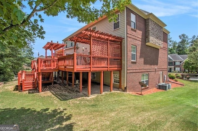 rear view of house with a yard, a pergola, cooling unit, and a wooden deck