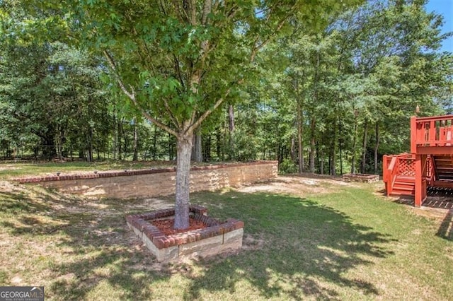 view of yard with a deck