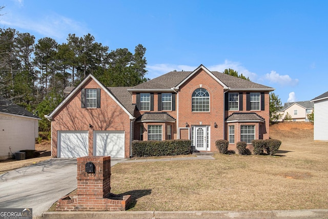 colonial house featuring brick siding, central AC unit, a garage, driveway, and a front lawn