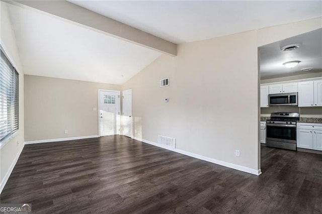 unfurnished living room featuring dark hardwood / wood-style flooring and lofted ceiling with beams