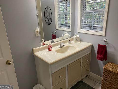 bathroom featuring vanity and tile patterned floors