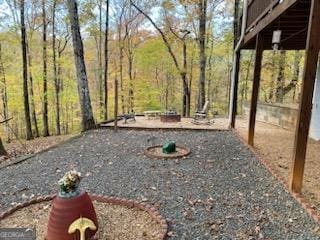 view of yard featuring a fire pit