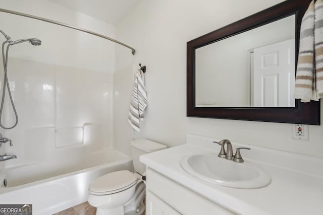 full bathroom with vanity,  shower combination, and toilet