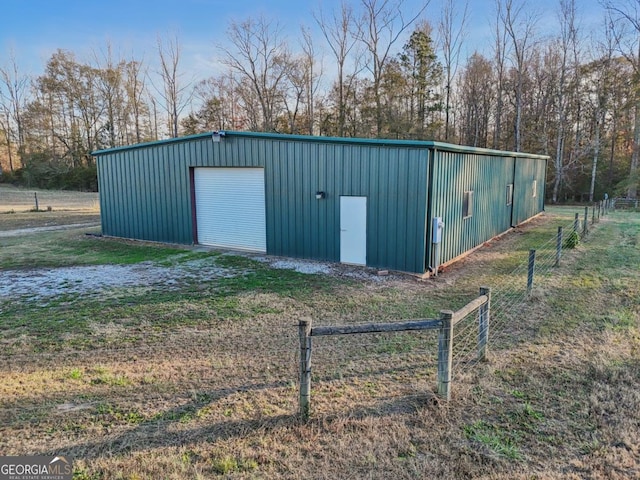 view of outdoor structure with a garage