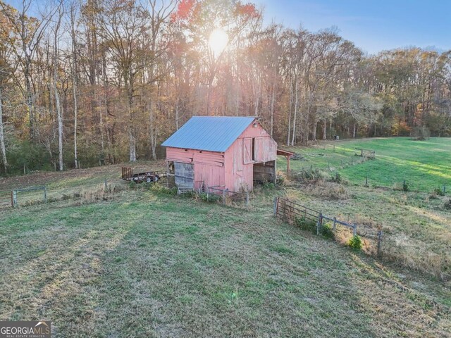 back of property featuring a porch and a lawn