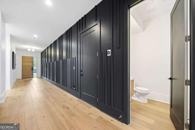 hallway featuring light wood-type flooring