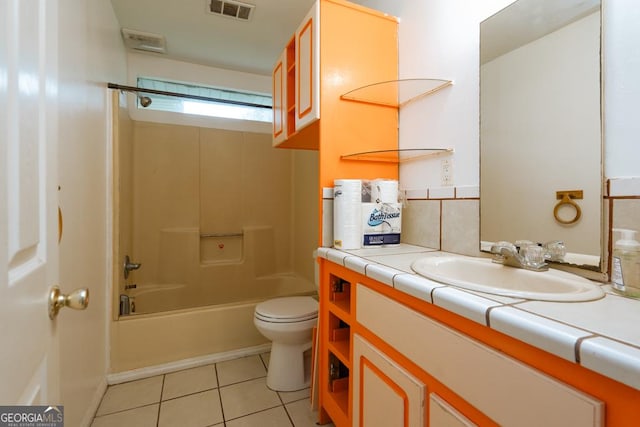 full bathroom with tile patterned floors, vanity, toilet, and shower / bathtub combination