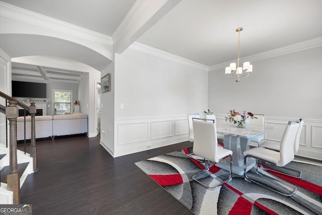 dining space featuring beam ceiling, coffered ceiling, an inviting chandelier, dark hardwood / wood-style flooring, and ornamental molding