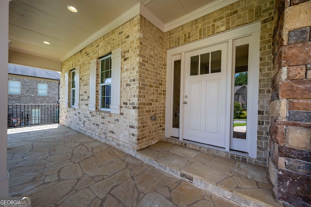 property entrance featuring covered porch