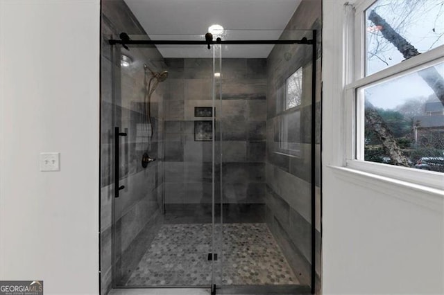 bathroom with an enclosed shower