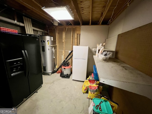 basement featuring white fridge, black fridge, and water heater