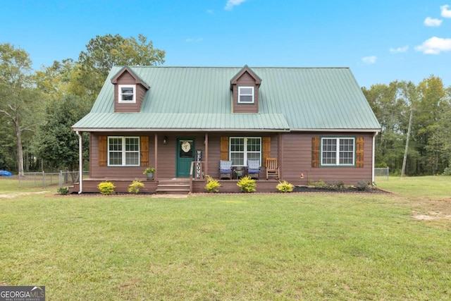 view of front facade with covered porch and a front lawn