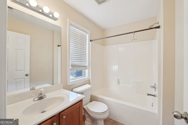 full bathroom with vanity,  shower combination, and toilet