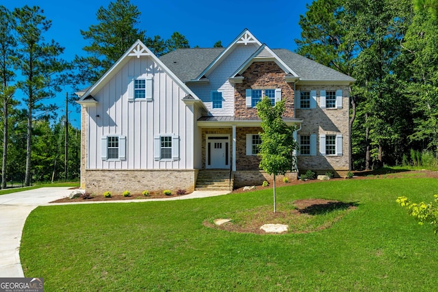 view of front of home with a front yard