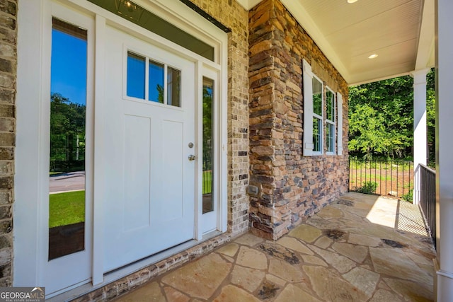 entrance to property with a porch