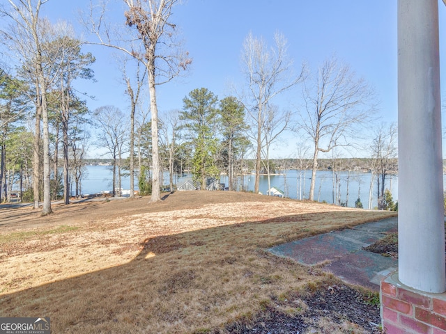 view of yard with a water view