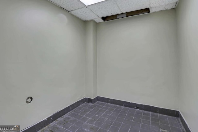 interior space featuring dark tile patterned flooring