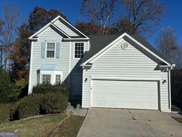 front of property featuring a garage