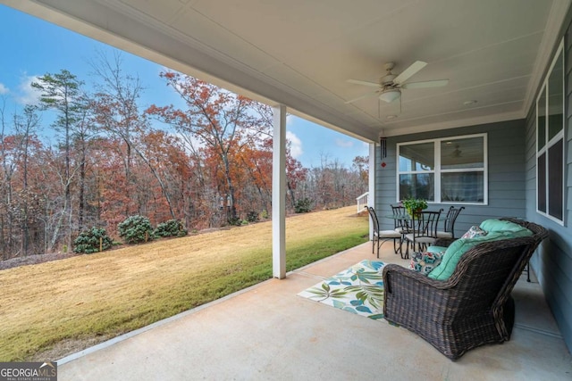 view of patio with ceiling fan