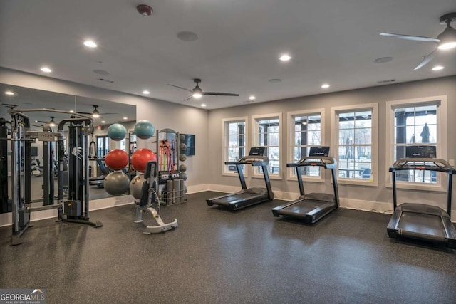 exercise room with ceiling fan