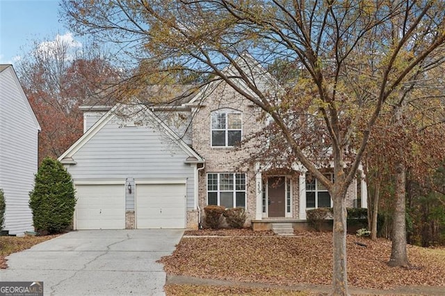 view of front of home with a garage