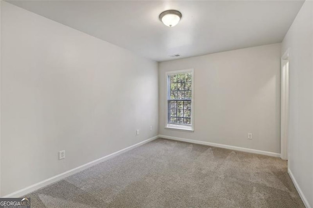 view of carpeted spare room