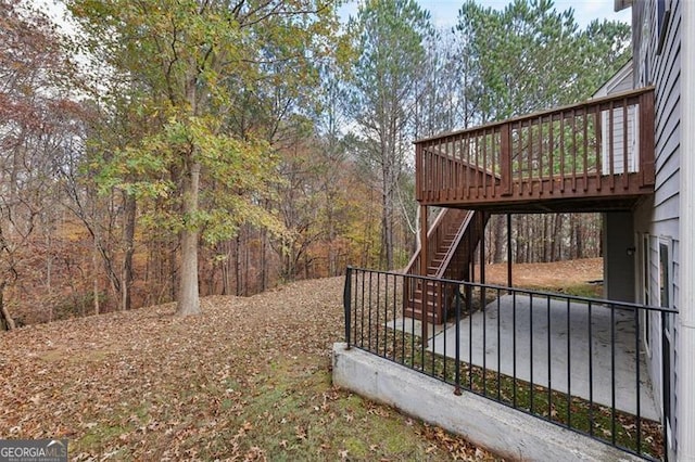 view of yard featuring a wooden deck