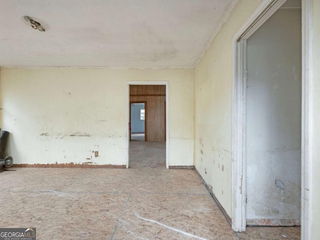 spare room with ornamental molding