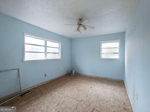 empty room with ceiling fan