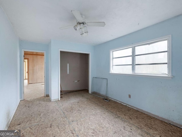 unfurnished bedroom with ceiling fan