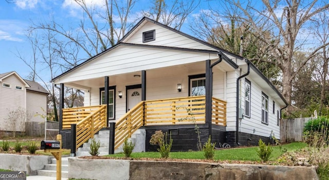 bungalow-style home with covered porch