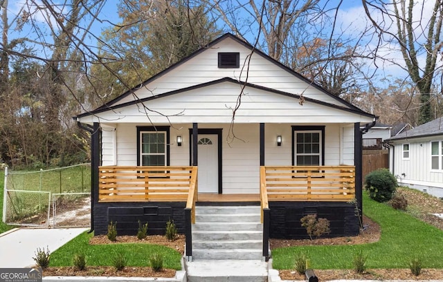 bungalow-style home with covered porch